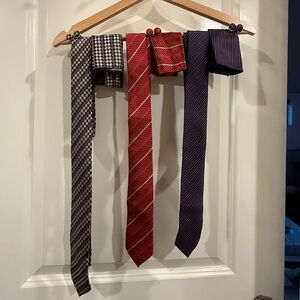 Set of 3 ties with matching cuff links and pocket square. 100% silk and blends.